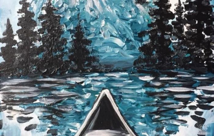 this image shows a canoe on a lake